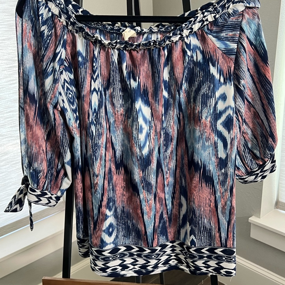Off shoulder printed top. Size M